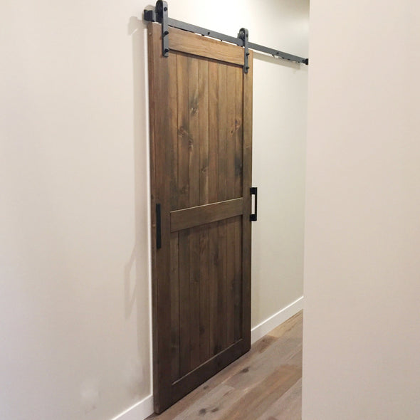 A divided door in Barn Board Brown with Big Wheel soft close barn door hardware