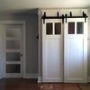 Bypassing white Craftsman style doors for a front hall closet