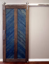 Chevron barn door in two tone blue and grey, with stainless steel Top of Door soft close hardware