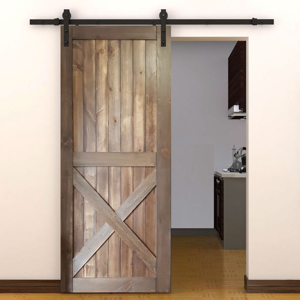 The Half X door in barn board brown with soft close barn door hardware.